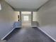 Cozy carpeted living room with neutral gray paint and lots of natural light at 5725 Cedar Pass, Fairburn, GA 30213