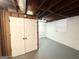 Unfinished basement area featuring painted walls and a convenient storage area at 3820 Union Sw Rd, College Park, GA 30349