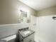 Bathroom featuring a vanity with granite top, tiled shower, and updated fixtures at 3820 Union Sw Rd, College Park, GA 30349