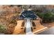 Aerial view of a stunning property with a manicured lawn and private driveway at 740 Bethpage Dr, Mcdonough, GA 30253