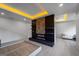 Modern bedroom showcasing a sleek entertainment center with a built-in fireplace at 740 Bethpage Dr, Mcdonough, GA 30253