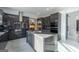 Modern kitchen boasts stainless steel appliances, gray cabinets, and a spacious center island at 740 Bethpage Dr, Mcdonough, GA 30253