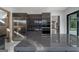 Contemporary kitchen featuring stainless steel fridge and double oven, and a large center island at 740 Bethpage Dr, Mcdonough, GA 30253