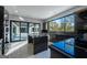 Contemporary kitchen with stainless steel appliances and sliding glass doors opening to the outside at 740 Bethpage Dr, Mcdonough, GA 30253