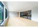 Spacious living area with hardwood floors, large windows, and modern decor at 740 Bethpage Dr, Mcdonough, GA 30253