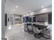 Open-concept living area features modern finishes, dining area, fireplace and plenty of light at 740 Bethpage Dr, Mcdonough, GA 30253