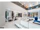 Expansive living room with large windows and luxury finishes at 740 Bethpage Dr, Mcdonough, GA 30253