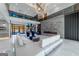 Open floor plan featuring a modern living area with a fireplace and second-story balcony at 740 Bethpage Dr, Mcdonough, GA 30253