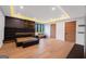 Spacious main bedroom with light wood floors, recessed lights and sitting area at 740 Bethpage Dr, Mcdonough, GA 30253