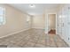 Neutral bedroom offering natural light, tile floors, and a calming atmosphere at 3411 Airline Rd, Mcdonough, GA 30252