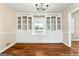 Dining room with hardwood floors and built-in cabinetry, offering a functional and elegant space at 3411 Airline Rd, Mcdonough, GA 30252