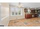 Cozy kitchen featuring custom wood cabinetry, stainless steel appliances, and stylish tile flooring at 3411 Airline Rd, Mcdonough, GA 30252