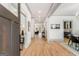 Long foyer with hardwood floors and elegant lighting at 1055 Ormewood Se Ave, Atlanta, GA 30316