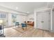 Finished basement with stylish furnishings and natural light from the window at 1055 Ormewood Se Ave, Atlanta, GA 30316