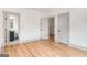 Bedroom with hardwood floors and light walls and trim and ensuite bath at 1055 Ormewood Se Ave, Atlanta, GA 30316