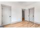 Bedroom with hardwood floors, light walls and trim and large window at 1055 Ormewood Se Ave, Atlanta, GA 30316