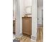 Hallway with a storage cabinet featuring a wood countertop and decorative vases at 1055 Ormewood Se Ave, Atlanta, GA 30316