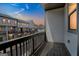 View from a wooden balcony showcasing the neighborhood townhomes at 2624 Caruso Way, Atlanta, GA 30339