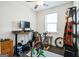 Versatile room with a window, hardwood floors, and space for a home office or gym setup at 2624 Caruso Way, Atlanta, GA 30339