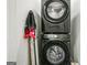 Modern laundry room featuring stacked Samsung washer and dryer for space-saving convenience at 2624 Caruso Way, Atlanta, GA 30339