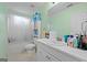 Bathroom featuring a vanity, white sink, and a bathtub with a shower curtain at 40 Berkshire Run, Covington, GA 30016