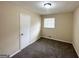 Neutral bedroom with carpet and one window at 2060 Sanders Dr, Austell, GA 30168