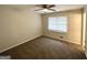 A cozy bedroom featuring a ceiling fan and a window for plenty of light at 29 Hickory Ct, Dallas, GA 30157