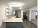 Well-equipped kitchen with modern appliances, granite countertops, and storage at 29 Hickory Ct, Dallas, GA 30157