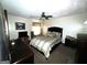 A bedroom featuring a ceiling fan, a window, and furnishings at 7619 Ward Ln, Jonesboro, GA 30236