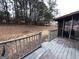 A view from the deck of the backyard and neighboring trees at 7619 Ward Ln, Jonesboro, GA 30236