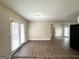 Open dining area features wood floors and access to a patio at 2846 Cocklebur Rd, Decatur, GA 30034