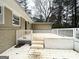 Spacious back deck made of wood, painted white, and ready for entertaining at 3647 Brookcrest Cir, Decatur, GA 30032