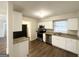 Stylish kitchen featuring white cabinets, stainless steel appliances, and granite countertops at 3647 Brookcrest Cir, Decatur, GA 30032