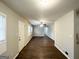 Spacious living room with modern flooring, neutral paint, and plenty of natural light at 3647 Brookcrest Cir, Decatur, GA 30032