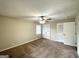 Large main bedroom featuring neutral colors and a ceiling fan at 4568 Dorset Cir, Decatur, GA 30035