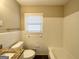 Clean bathroom featuring white subway tile, granite vanity, and a bathtub at 1785 San Gabriel Ave, Decatur, GA 30032