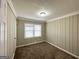 Cozy bedroom featuring neutral carpet, a large window, and light-toned walls at 1785 San Gabriel Ave, Decatur, GA 30032