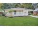 Charming single-story home with a welcoming front porch and a well-manicured lawn at 191 Florida Sw Ave, Atlanta, GA 30310