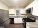 Well-equipped kitchen featuring modern stainless steel appliances and granite countertops at 191 Florida Sw Ave, Atlanta, GA 30310