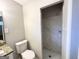 Bathroom with tiled shower and modern fixtures at 3415 Homera Pl, Decatur, GA 30032
