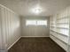 Bedroom with built-in bookshelves at 3415 Homera Pl, Decatur, GA 30032