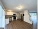 Open kitchen features stainless steel appliances, granite countertops, and hardwood floors at 3415 Homera Pl, Decatur, GA 30032