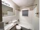 Bathroom featuring a tub-shower combination and granite countertop sink at 648 Ozburn Nw Rd, Atlanta, GA 30318