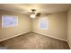 Bedroom featuring a ceiling fan and two large windows at 3174 Kingston Nw Rd, Atlanta, GA 30318