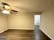View of a spacious living room featuring hardwood floors and neutral wall paint at 3174 Kingston Nw Rd, Atlanta, GA 30318