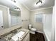 Well-lit bathroom featuring granite vanity top and shower-tub combination at 3609 Croft Nw Pl, Atlanta, GA 30331