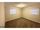 Inviting bedroom with soft carpet and natural light from two windows at 3609 Croft Nw Pl, Atlanta, GA 30331
