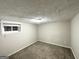 Bedroom with carpet floors, neutral walls, natural light and a double window at 4250 Utoy Sw Ct, Atlanta, GA 30331