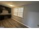 The office features built in desk and wood-look floors at 6982 Knollwood Dr, Morrow, GA 30260