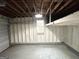 Spacious garage with ample room for parking and storage, featuring bright lighting and a window at 1756 Lynn Ln, Decatur, GA 30032